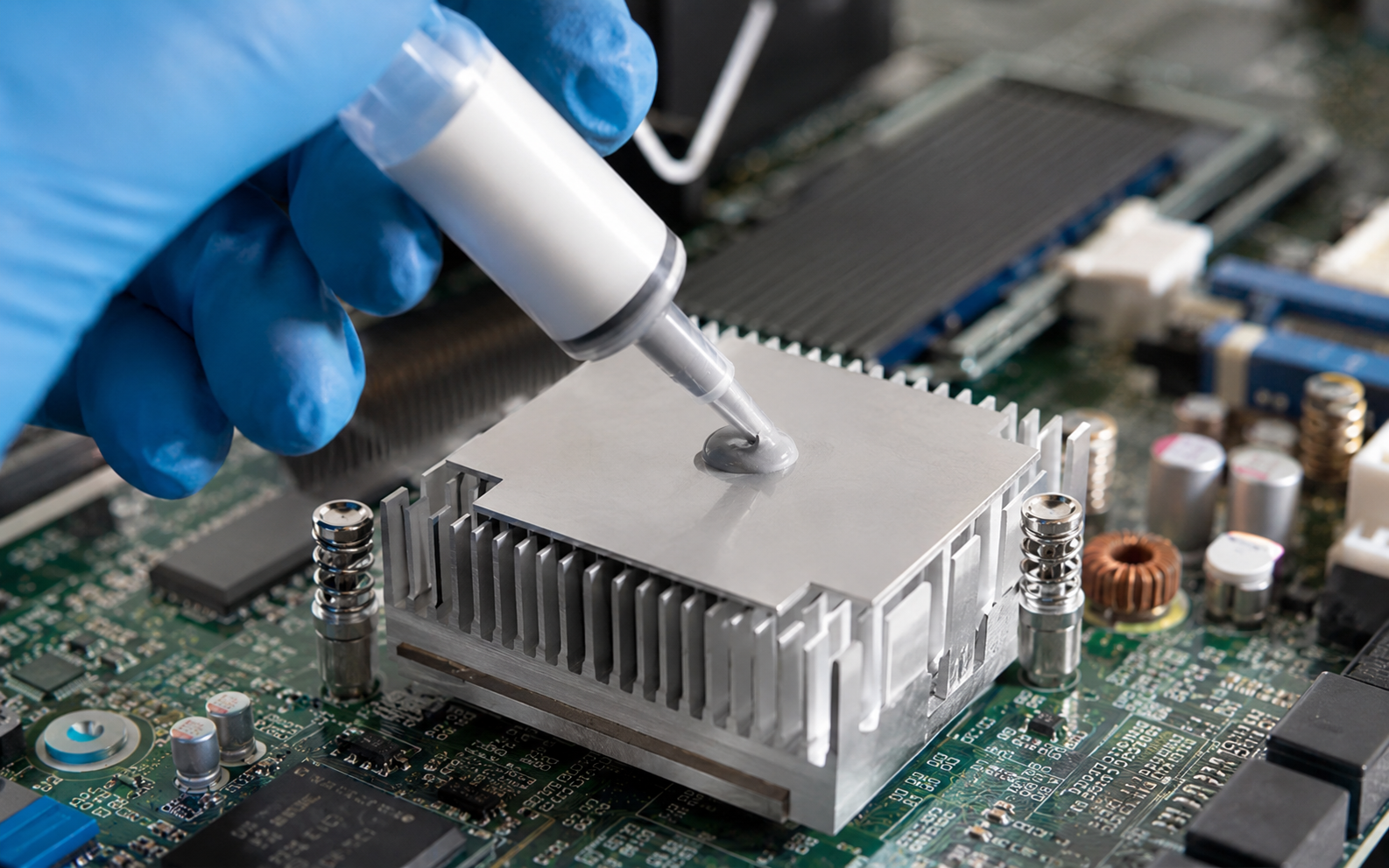 Thermally conductive adhesive application on heat sink